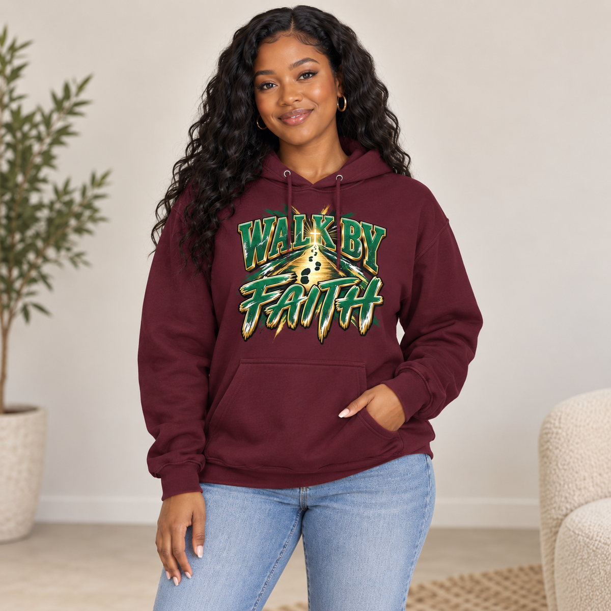 Young Black woman wearing maroon Walk By Faith Christian hoodie